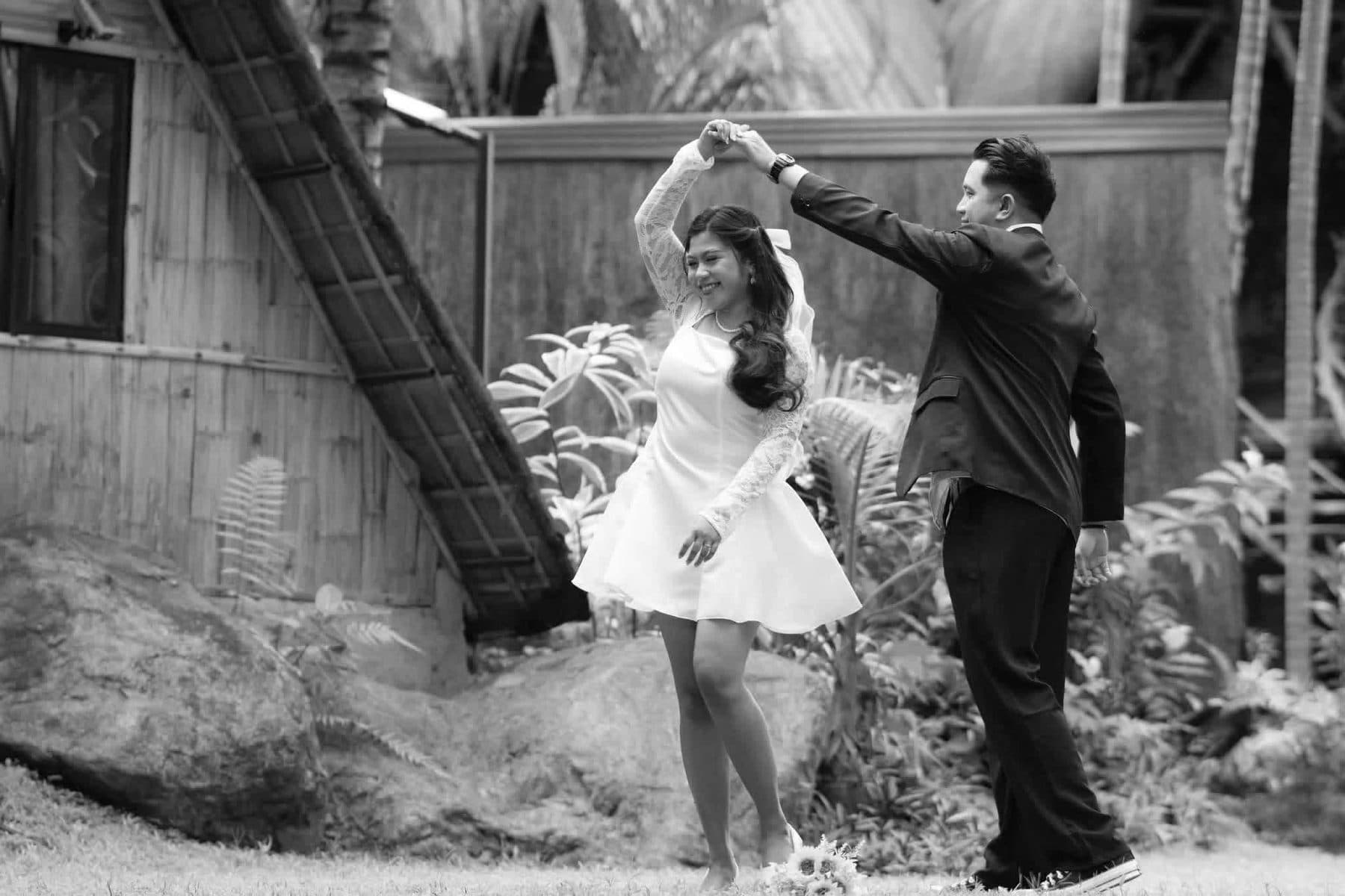 Couple sharing a first dance in a garden
